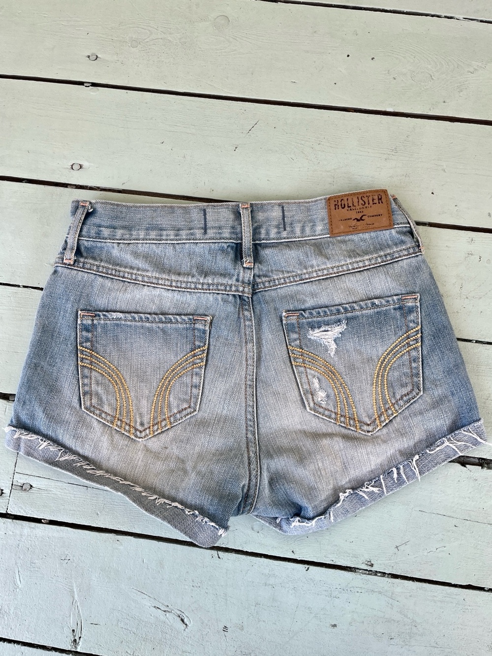 Vintage Hollister Light Wash 2000s Denim Cutoff Shorts embroidered pocket detail